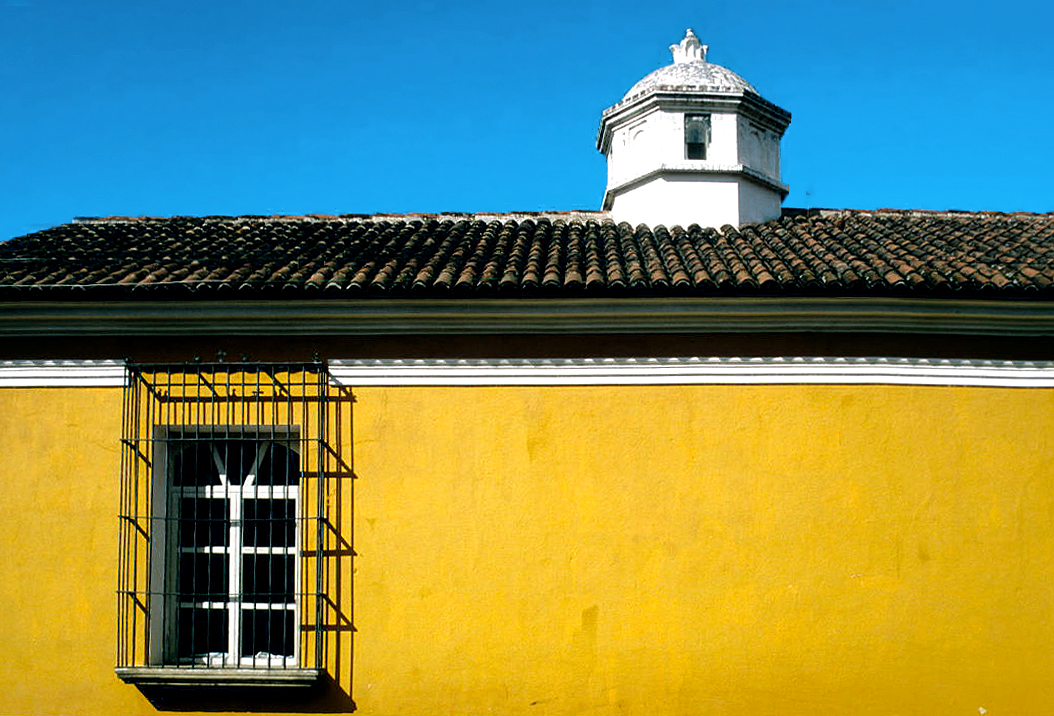 Colorful street scene in Antigua Guatemala with restaurants and cafes