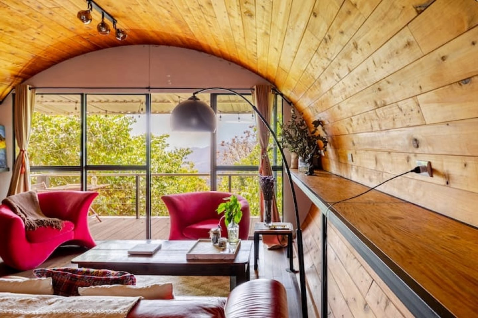 Luxury romantic wood-cabin with private elevated terrace, volcano views, and immersive forest setting at Finca El Tambor, El Hato, Antigua Guatemala