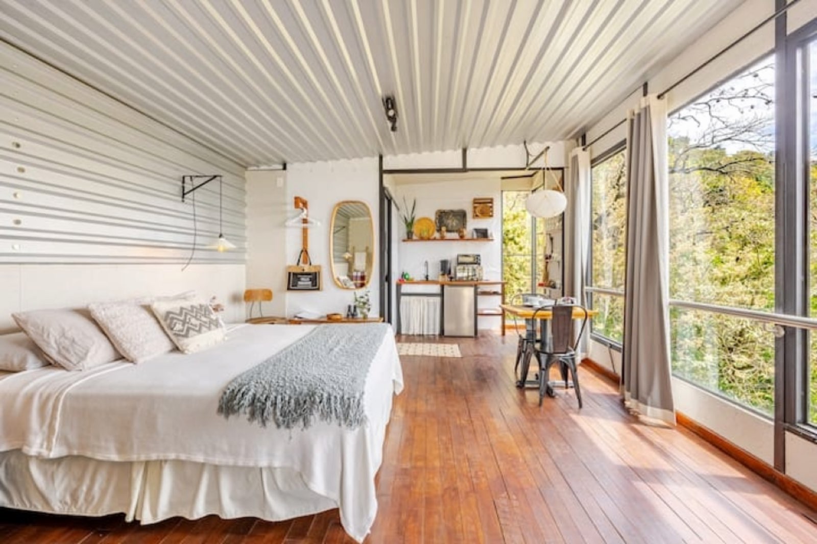 Rustic nature studio with volcano views, natural light, and private patio surrounded by nature reserve at Finca El Tambor, El Hato, Antigua Guatemala